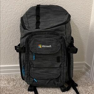 Microsoft Origaudio “The Mission Pack” Charcoal Backpack with Blue Accents